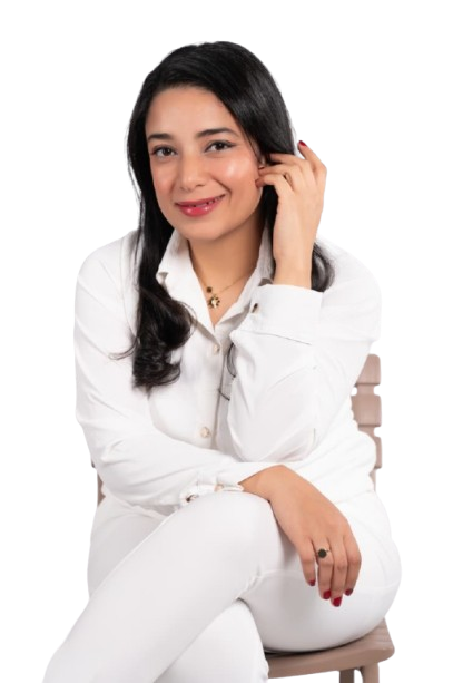 Dr. Rana Mosaad seated, wearing a white shirt, smiling warmly